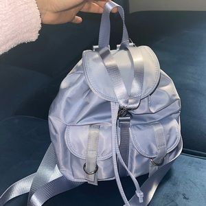 Nylon backpack in a periwinkle-blue hue.